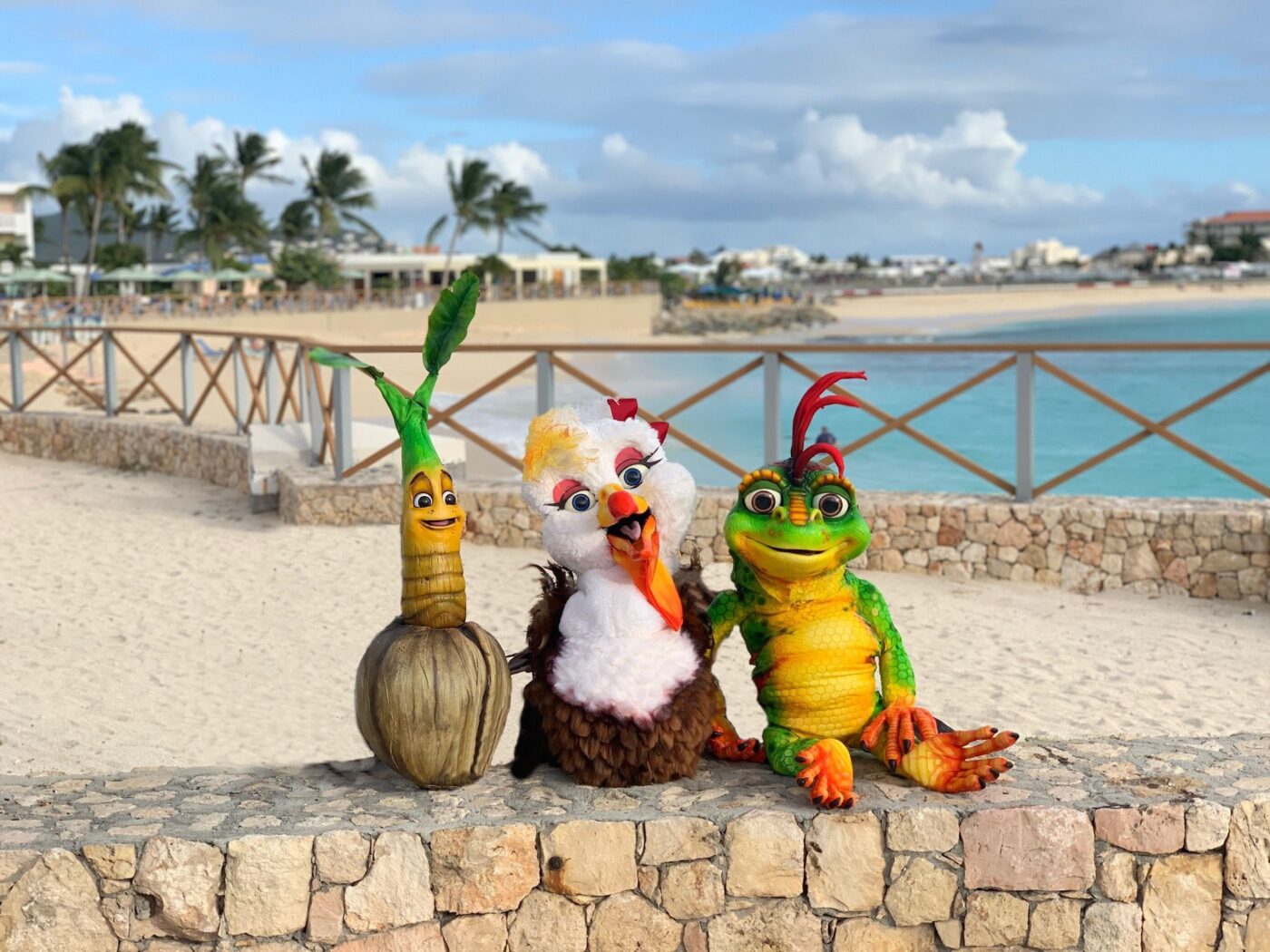 three puppet mascot characters form the cast of the beachouse crew in St Maartens