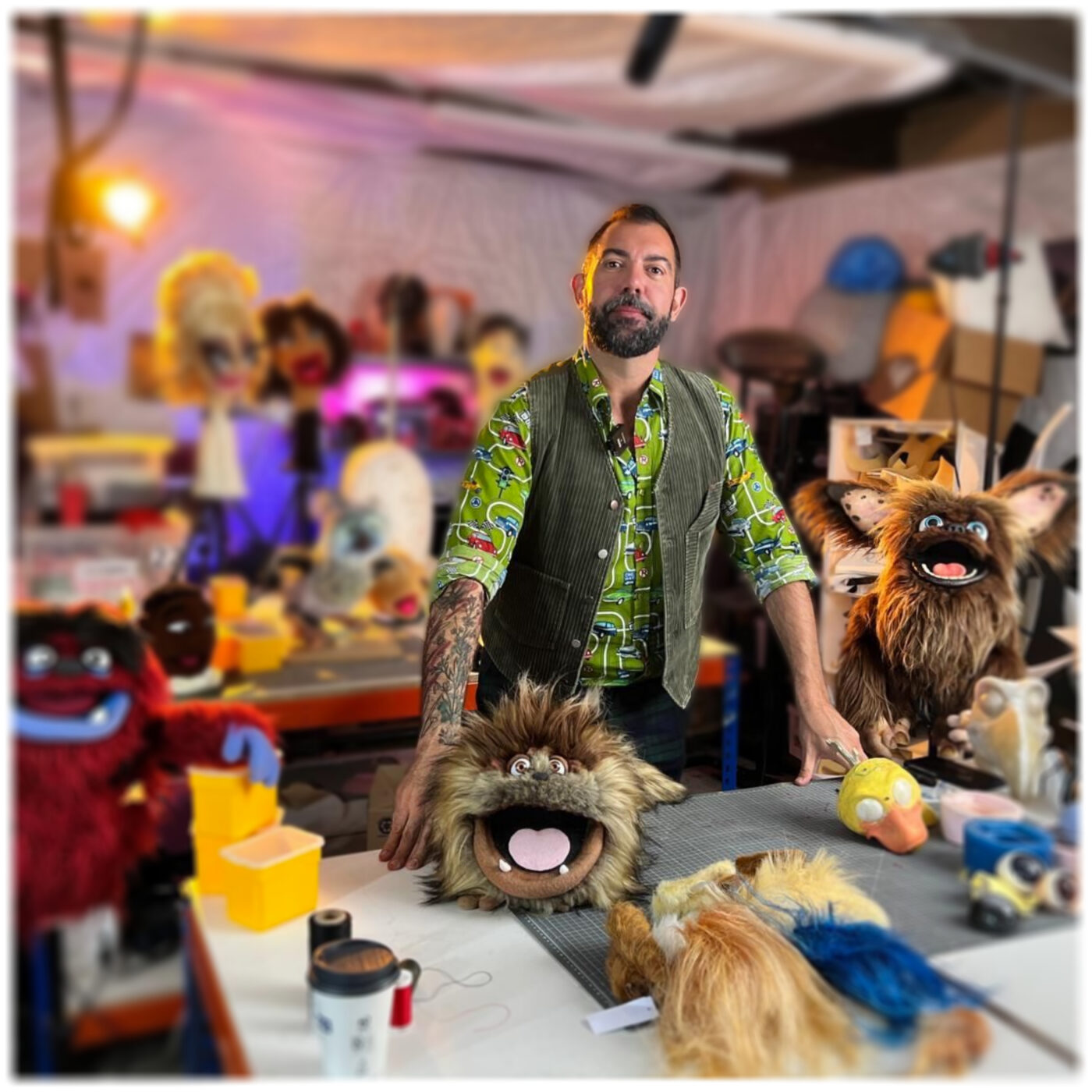 chris of Fuzzy Lightbulb stodd in the puppet workshop